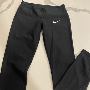 Nike winter weather leggings with patterned detail. Size S